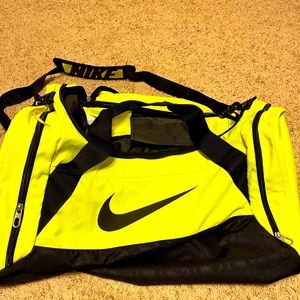 Nike yellow duffel bag